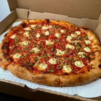 byo vegan pizza w/garlic confit + pickled serrano + Castelvetrano olives at Dantini Pizza in Seattle