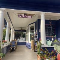 Cute Porch Outdoor Seating Area - They Offer Blankets!  at The Queen Bean Coffee & Social House in Modesto