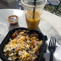 Mango Smoothie (Water-Based) and Vegan Breakfast Bowl (Filling but Uninspiring) - Also, I was Eating at Place - Given Take Away Items - So Much Plastic 🤯😩  at The Queen Bean Coffee & Social House in Modesto