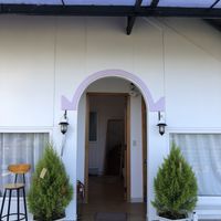 The entrance to our room and another guest room upstairs  at Dalat Harmony Garden in Da Lat