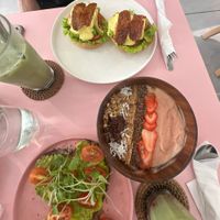 tofu benedict, smoothie bowl (happy stomach), avocado toast and 2 strawberry matcha latte at KURUMI - Healthy Vegan Food & Desserts in Hoi An