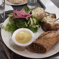 Tofu filled potatoes with salad at Picnic Rovaniemi  in Rovaniemi