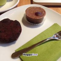 Vegan chocolate cookie and raw mini vegan pecan cheesecake. Both were gluten free with no added sugar. at Dynamo Bake in Budapest