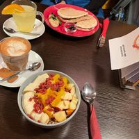 Soy yoghurt with granola and fruits and panini with grilled vegetables  at Cafe Luca's in Immenstadt