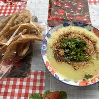 Soy crisps & yellow spilt pea porridge Burmese style -so good  at Sarima Yellow Bean Noodle ซารีมะห์ ร้านข้าวฟืนถั่วเชียงใหม่ in Chiang Mai