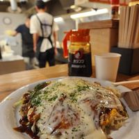 Vegetable okonomiyaki (with vegetarian sauce) + cheese on top at undo - あんど in Hiroshima