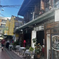 Front of restaurant, name above in Thai   at Thai Vegetarian & Vegan Restaurant in Bangkok