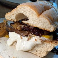 Seitan n Cheeze: House-Made Seitan "Beef", Beer Cheeze, Crispy Onions, Blueberry BBQ Sauce, Horsey Mayo, Hoagie Bun. (GR Vegan Chef Challenge 9/25) at The Sovengard in Grand Rapids