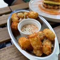 Parm tots at AM Cafe in Vancouver