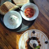 Burrito and blueberry waffle at AM Cafe in Vancouver
