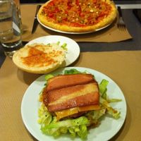 Pizza with soja, tofu and pepper, and "Yankee" burger. at Sol Veggie in Logrono