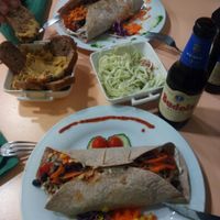Burritos, crudiespaguetis, hummus y cerveza ecológica at Green Break Vegan Restaurant in San Sebastian