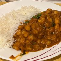 CHANNA MASALA WITH STEAMED BASMATI RICE  at India's Restaurant in Houston