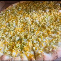 Mac and cheese pizza!!!  at Dimo's Pizza - Logan Square in Chicago