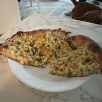 The Vegan Mac Pizza. It is SO GOOD 😍😍  at Dimo's Pizza - Logan Square in Chicago