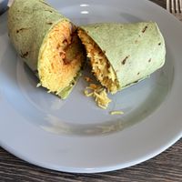 Spinach falafel roll wrap with hot Peri sauce and no garlic sauce  at Vasco's Peri Peri in Arlington Heights