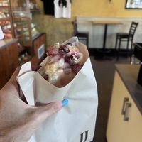 Vegan raspberry scone with maple glaze   at JJ Bean Coffee Roasters  in Vancouver