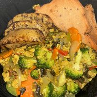 Curry tofu scramble  at Seven Days  in Dennis