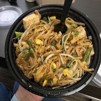 Rice noodles with tofu and a ton of veggies (like broccoli, green peppers, onions, corn, and green beans).  at The Bowl in Albany