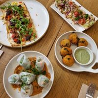 Various tapas: Flammkuchen, spring rolls, bruschetta, croquettes at Kosmopoliet in Bruges