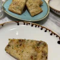 Half a Garlic bread with cheese   at Earth Cafe @ Churchgate in Mumbai