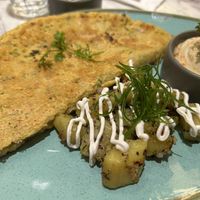 Omelette with hummus and potatoes   at Earth Cafe @ Churchgate in Mumbai
