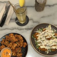 cauliflower wings + caesar salad  at Vrutal - Diputació in Barcelona