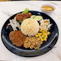 Nasi Lemak with Drumstick.

The rice was very fragrant and it was a good sized portion. at Kang Su Vegetarian 康素 - Macpherson  in Central Singapore