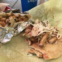 Tofu taco & tofu fajita burrito (sub non-dairy sauce on both). Looks messy but so delicious! Must try! at Joel's Mexican Food in Sandpoint