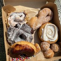 Assorted donuts, donut holes and cinnamon bun  at Glory Doughnuts & Diner in Frederick