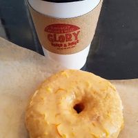 Coffee and a "blood orange" doughnut, YUM! at Glory Doughnuts & Diner in Frederick