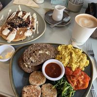 Pancakes with coconut yoghurt and blueberry compote. Faux Irish breakfast. Yum!  at The Lighthouse Cafe in Galway