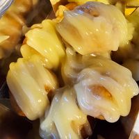 Lemon cream as a topping on 8 Loukoumades at LoukouMania in Thessaloniki