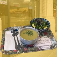 Soup and seasonal bowl, superposed over front of Le Botaniste at Le Botaniste - Penn Plaza in New York City