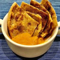Aloo paratha with tomato chutney  at L'APERO in Dubai