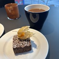 Rawfood pastry and coffee with oat milk   at Wayne's Coffee  in Hudiksvall