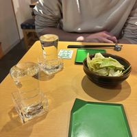 Sake and a sesame cabbage appetiser   at Vegan Izakaya Nowhere in Tokyo