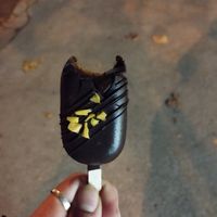 Mango cakepopsicles with dark chocolate at Desserts & Dreams - Butik Sladic in Ljubljana