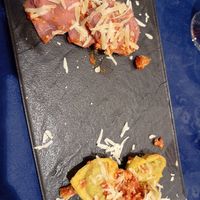 Tortelloni patate e porri e ricotta e spinaci al ragù at Trattoria MODErNA in Montale