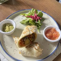 Breakfast burrito with potatoes, peppers, onions, zucchini, avocado, quinoa  at Café San Antonio in Cartagena