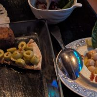 The delicious pita wedges with olive tapenade left, hummus right. at Orient Bay in Zihuatanejo