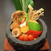 Spicy fried rice with coconut meat, battered enoki mushroom and lotus root. at Vegan Pranakhon in Bangkok