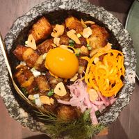 Crispy sweet pork, garlic confit rice, vg egg yolk (apparently tomato based - v impressive) at Vegan Pranakhon in Bangkok