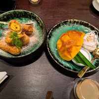 Banana Fritters and Mango Sticky Rice desserts at Vegan Pranakhon at Vegan Pranakhon in Bangkok