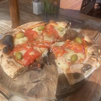  Vegan pizza - 24 000. It was huge   at Berlina in San Carlos De Bariloche