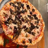 Vegan cheese, mushrooms and olives  at Dylan's Coal Oven Pizzeria in Port Aransas