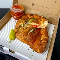 BYO calzone w/eggplant + zucchini + roasted garlic (cut in half for pic) at Modena Pizza & Pasta in Seattle