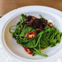 Fried vege with spicy mushrooms sauce on top at Buddha -菩茶 in Dali