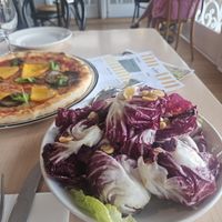 Radicchio salad and super Mario pizza with vegan cheesee  at Farm Vigano in Melbourne