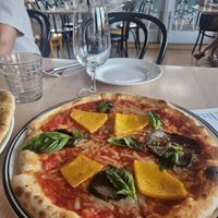 Super Mario pizza w/ vegan cheese  at Farm Vigano in Melbourne